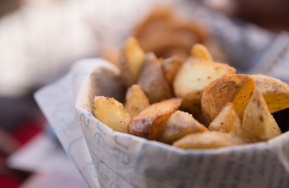 Waarom zijn frieten in België anders dan in Nederland?